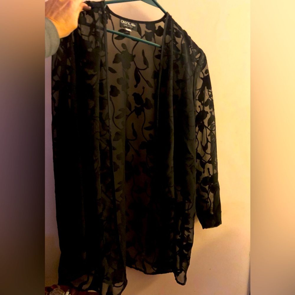 Sheer jacket w/threaded embellishments.